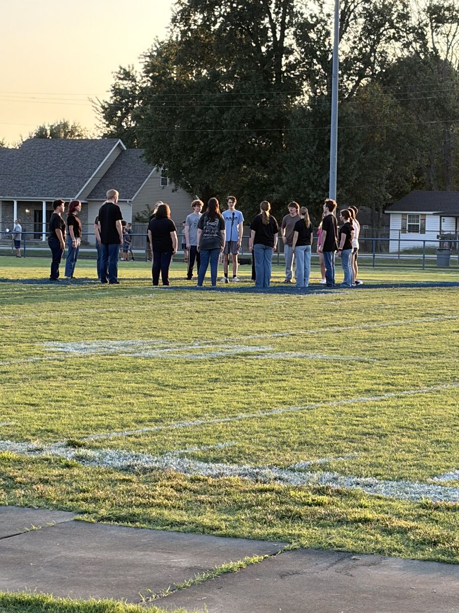 RHS Honor Choir singing National Anthem 